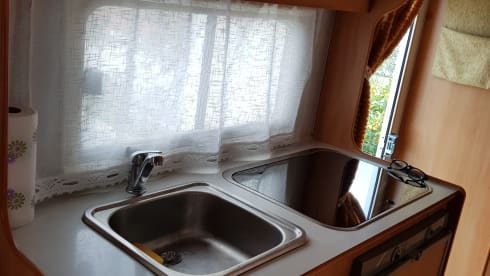 Seven-berth motorhome with double dinette