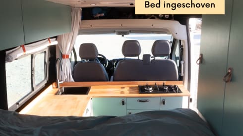 Compact off-grid Peugeot Boxer with length bed for 2 people