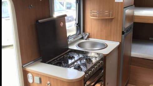 Cel4night – 7-seater overcab motorhome