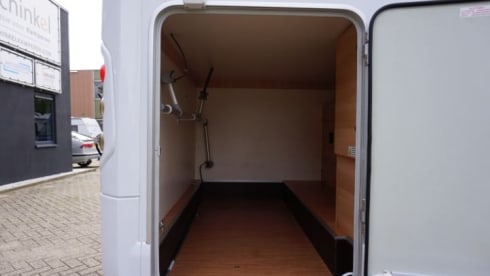 Nice compact 2 person camper with single beds.