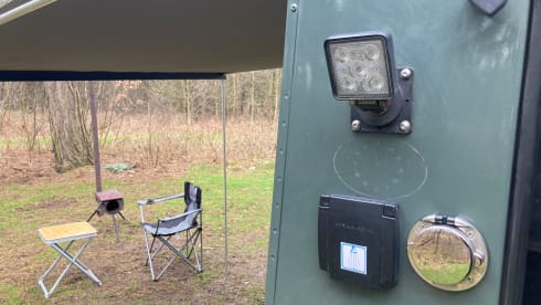 2p Land Rover Defender camper with lifting roof