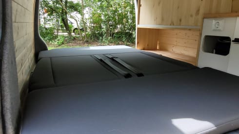 4-person Volkswagen with pop-up roof and long wheelbase for extra space