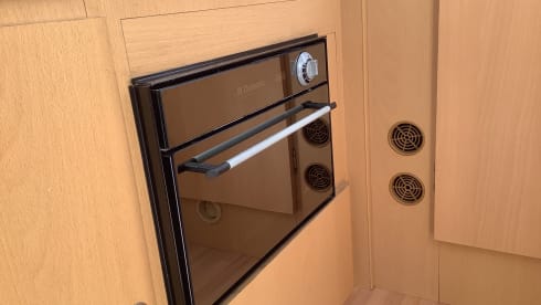 Semi-integrated camper