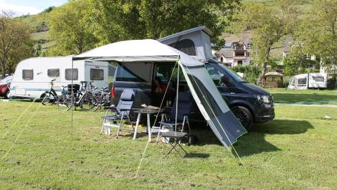 nice VW T6 Multivan with wide bed, pop-up roof, automatic