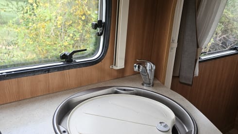 Comfortable motorhome with queen bed and electric bicycle carrier 