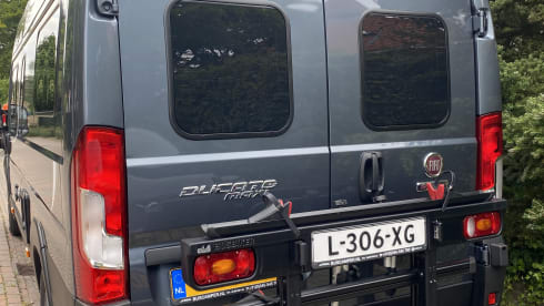 Bus camper PÖSSL, 2 length beds, 2 seats