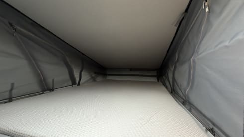 Making Memories 10 – 2024 Hymer Free 602 Automatic with a pop-top roof and a 4-person bike carrier