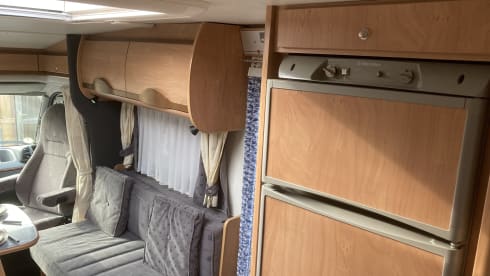 Bürstner Family Camper 4 persons, with bicycle carrier.
