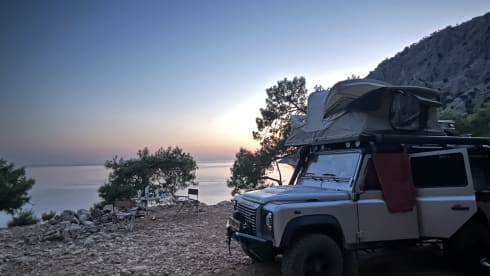 Great adventures with the family, tough Landrover Defender with roof tent