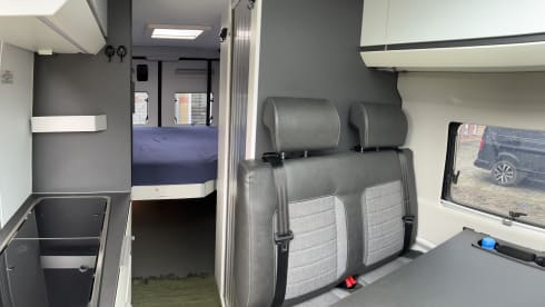 Fiat Adria 640 bus camper with large garage and fold-down bed 