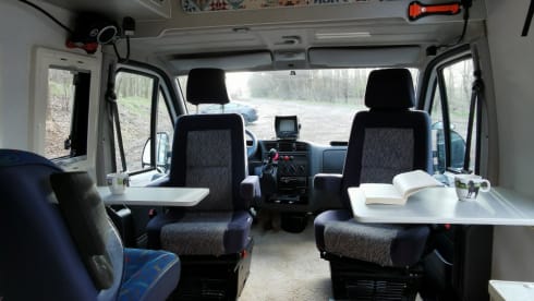 On an adventure with a reliable bus camper.