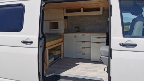 Wood live – Rent a VW T5 Wood live