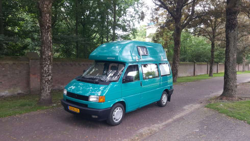 Summer -VW T4 California with fixed sleeping roof