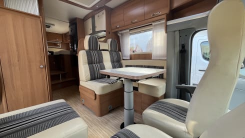 4p LMC semi-integrated with awning, air conditioning and cruise control.