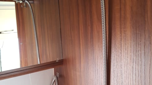vakantiehuisje op 4 wielen – 2p Karmann bus, with air conditioning in living area