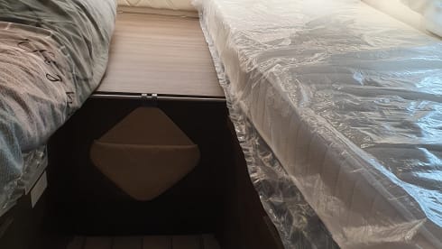 8 – luxury 4 person mclouis Carat 2022 with fixed bed in the back