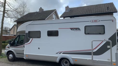 4p LMC semi-integrated with awning, air conditioning and cruise control.