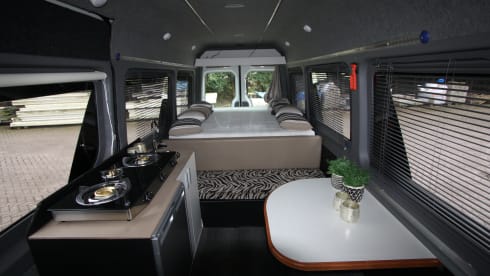 Completely restyled Mercedes Sprinter with XXL luxury fixed bed (double)