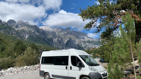 Compact off-grid Peugeot Boxer with length bed for 2 people