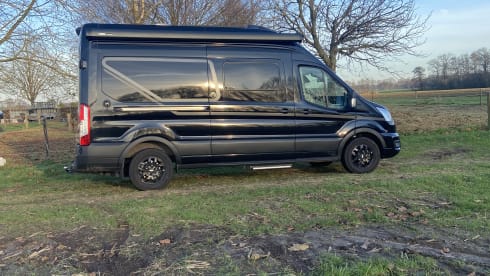 Beautiful 2-person Ford camper van from 2023 with luxurious furnishings