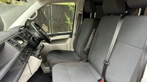 Biscy – 4 berth VW Campervan (Gas stove, 2 double beds, & gated car storage)