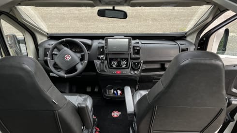 Fiat Adria 640 bus camper with large garage and fold-down bed 