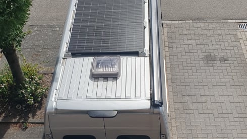 Betsie – Camping-car Euro6 avec un joli lit