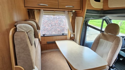 Comfortable motorhome with queen bed and electric bicycle carrier 