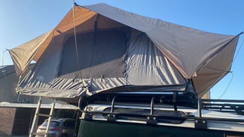 Avontuurlijke Defender 90 Land Rover met dak tent 2 persoons