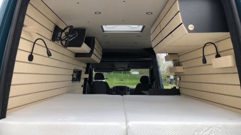 New cool off-grid Mercedes Sprinter bus camper with length beds