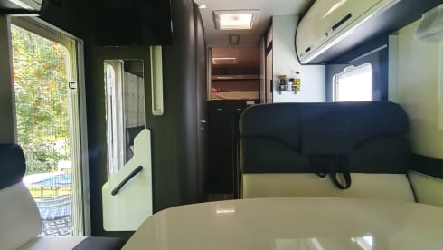 Luxury mobile home with spacious beds and a very large garage