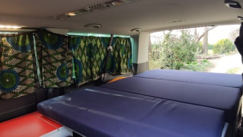 bluesky – vw t5 long wheelbase, free on the road surrounded by a blue sky