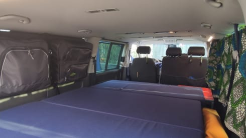 bluesky – vw t5 long wheelbase, free on the road surrounded by a blue sky