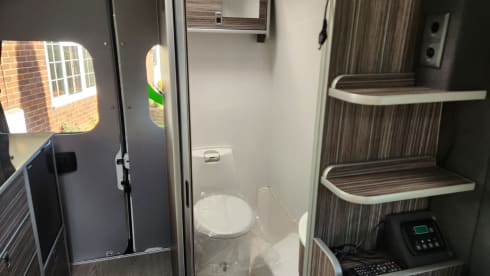 Lizzy – Sleeps 2 and has a loo, the tardis of campers