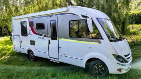 First Class**** – Bürstner with Air Conditioning, Queen Bed, Roadside Assistance Insurance