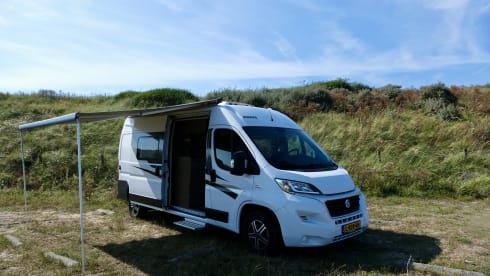 Atmospheric 4p Knaus Boxstar Family bus camper