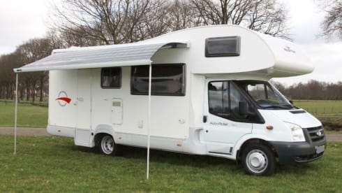 Spacious furnished family camper with bunk beds and air conditioning