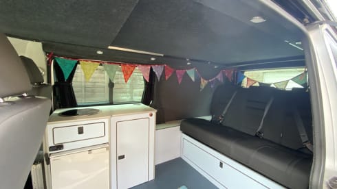 Iona – LWB 4 Berth VW Transporter with 'king size' bed & pop top