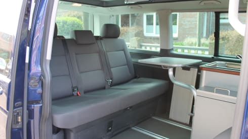 powerful VW T5 Multivan camper van with spacious Reimo pop-up roof