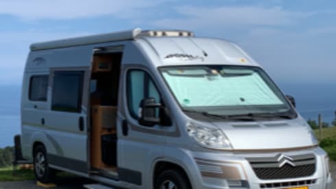 Compact Pössl 2Win factory-built bus camper (dog allowed)