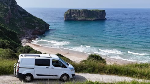 Cosy, compact off-grid Ford camper van