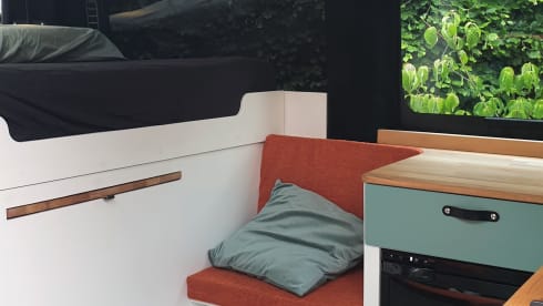 Compact off-grid Peugeot Boxer with length bed for 2 people