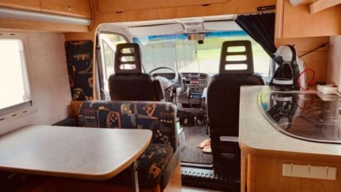 Attractive camper with fixed bed and easy to park