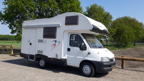 Spacious Fiat 2006 with a fixed bed, air conditioning and a very cozy interior.