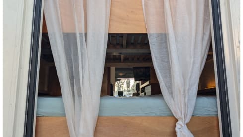  Old postal wagon transformed into a self-sufficient 4-person camper