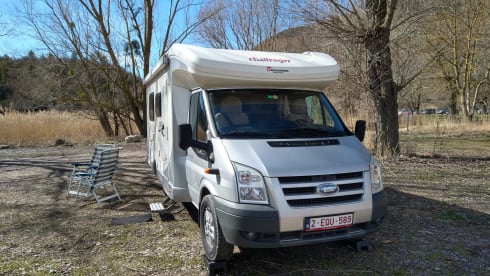 Comfortable motorhome with queen bed and electric bicycle carrier 