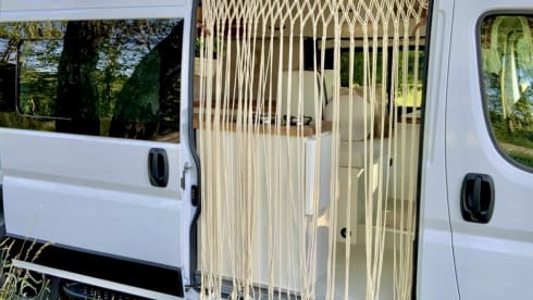 Luxurious off-grid bus from 2021 with a super atmospheric interior 