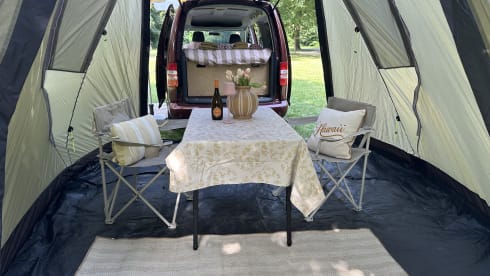 Super nice Volkswagen Caddy Maxi campervan from 2011 with tent, 4p