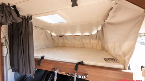 LMC Integral Camper with round seating layout