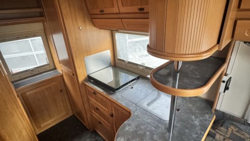 E610 gezinscamper – 4p Hymer integrated 6.2m